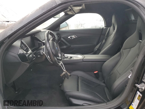 2022 BMW Z4 sDrive30i with VIN WBAHF3C04NWX42062, listed as a Copart auction lot 84463034 with 0 mi miles and Salvage Title. Bid and sale history available at carsss.com. Image 7.