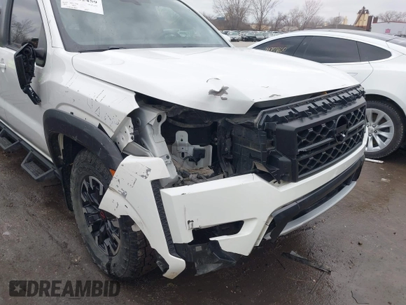 2022 Nissan Frontier SV z VIN 1N6ED1EJ2NN646035, wystawiony jako IAAI lot #41702459 z przebiegiem 93 030 mil mil oraz . Historia ofert i sprzedaży dostępna na DreamBid. Obrazek 6.