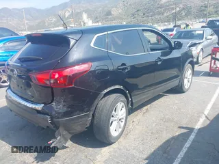 2017 Nissan Rogue SV with VIN JN1BJ1CP6HW021810, listed as a IAAI auction lot 42174714 with 91,180 mi miles and . Bid and sale history available at DreamBid. Image 4.