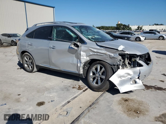 2012 Lexus RX 350 with VIN 2T2ZK1BA6CC069052, listed as a Copart auction lot 77817514 with 132,615 mi miles and Salvage Title. Bid and sale history available at DreamBid. Image 4.