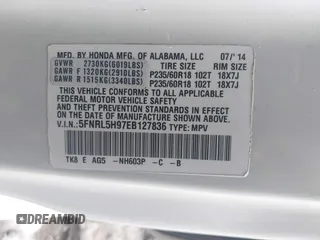 2014 Honda Odyssey Touring with VIN 5FNRL5H97EB127836, listed as a IAAI auction lot 41497413 with 174,914 mi miles and . Bid and sale history available at DreamBid. Image 9.