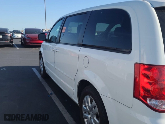 2015 Dodge Grand Caravan American Value with VIN 2C4RDGBG3FR732989, listed as a IAAI auction lot 42175478 with 91,301 mi miles and . Bid and sale history available at DreamBid. Image 1.
