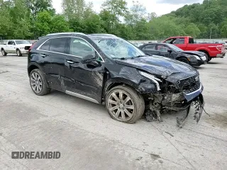 2020 Cadillac XT4 FWD Premium Luxury with VIN 1GYFZCR46LF113499, listed as a Copart auction lot 57534205 with 64,859 mi miles and Salvage title. Bid and sale history available at DreamBid. Image 14.