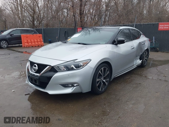 2018 Nissan Maxima SL z VIN 1N4AA6AP1JC394078, wystawiony jako IAAI lot #41197428 z przebiegiem 91 281 mil mil oraz . Historia ofert i sprzedaży dostępna na DreamBid. Obrazek 2.