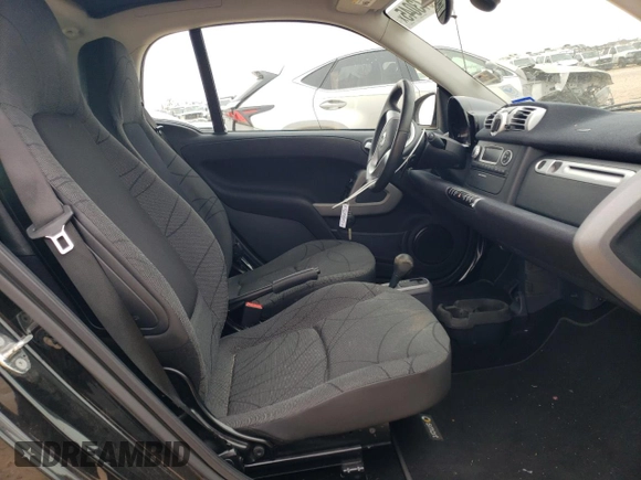 2015 Smart fortwo Passion z VIN WMEEJ3BA2FK815423, wystawiony jako Copart lot #42573045 z przebiegiem 11 588 mil mil oraz Szkoda całkowita • Salvage title. Historia ofert i sprzedaży dostępna na DreamBid. Obrazek 10.