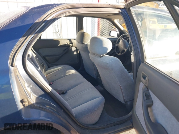 1994 Toyota Camry LE with VIN 4T1SK12EXRU374215, listed as a IAAI auction lot 41581093 with 80,397 mi miles. Bid and sale history available at carsss.com. Image 8.
