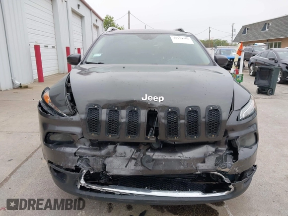 2014 Jeep Cherokee Limited z VIN 1C4PJMDB2EW182111, wystawiony jako IAAI lot #42179182 z przebiegiem 156 257 mil mil oraz . Historia ofert i sprzedaży dostępna na DreamBid. Obrazek 12.