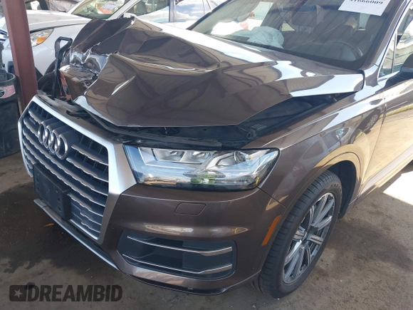2018 Audi Q7 Premium Plus z VIN WA1LHAF79JD044647, wystawiony jako IAAI lot #41666009 z przebiegiem 60 087 mil mil oraz . Historia ofert i sprzedaży dostępna na DreamBid. Obrazek 6.