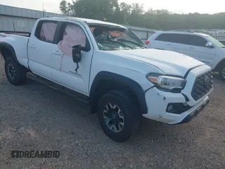 2021 Toyota Tacoma SR5 with VIN 5TFDZ5BN8MX067522, listed as a IAAI auction lot 42126391 with 40,838 mi miles and . Bid and sale history available at DreamBid. Image 1.