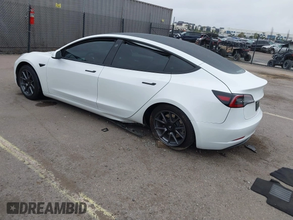 2023 Tesla Model 3 with VIN 5YJ3E1EA5PF505856, listed as a IAAI auction lot 41885837 with 28,206 mi miles and . Bid and sale history available at carsss.com. Image 3.