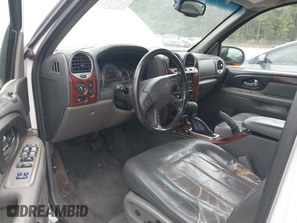 2003 GMC Envoy SLT with VIN 1GKES16S936189719, listed as a IAAI auction lot 42122292 with 289,810 mi miles and . Bid and sale history available at DreamBid. Image 5.