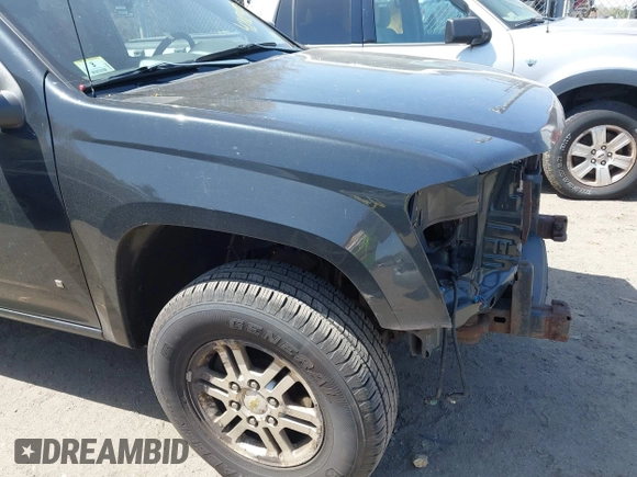 2009 Chevrolet Colorado Work Truck with VIN 1GCDT199498138526, listed as a IAAI auction lot 42112455 with 211,039 mi miles. Bid and sale history available at carsss.com. Image 14.