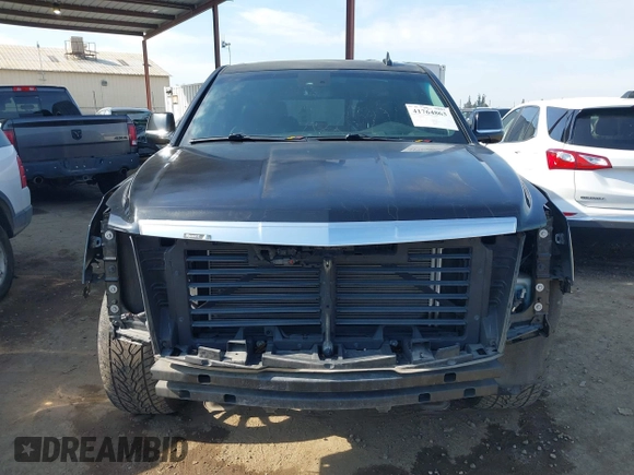 2017 Cadillac Escalade Luxury z VIN 1GYS4BKJ1HR201261, wystawiony jako IAAI lot #41764863 z przebiegiem 125 101 mil mil oraz . Historia ofert i sprzedaży dostępna na DreamBid. Obrazek 13.
