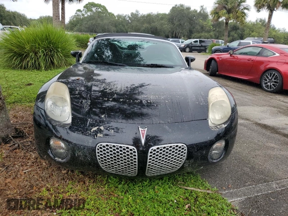 2006 Pontiac Solstice z VIN 1G2MB33B56Y000343, wystawiony jako Copart lot #74567004 z przebiegiem Nie podano mil oraz Szkoda całkowita • Salvage title. Historia ofert i sprzedaży dostępna na DreamBid. Obrazek 5.