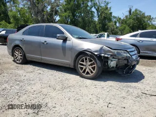 2012 Ford Fusion SEL with VIN 3FAHP0JAXCR279876, listed as a Copart auction lot 54004525 with 125,838 mi miles and Salvage title. Bid and sale history available at DreamBid. Image 4.