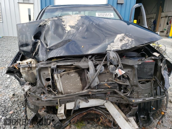 2009 Toyota Tacoma with VIN 5TEUU42N39Z660570, listed as a Copart auction lot 52025513 with 106,815 mi miles and Salvage title. Bid and sale history available at DreamBid. Image 11.
