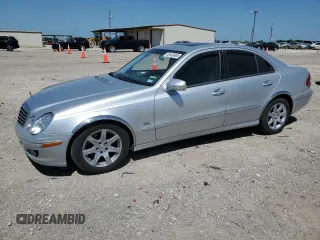 2008 Mercedes-Benz E 320 with VIN WDBUF22X88B230325, listed as a Copart auction lot 52443865 with 210,373 mi miles and Salvage title. Bid and sale history available at DreamBid. Image 1.