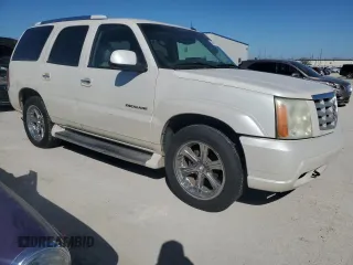 2003 Cadillac Escalade с VIN 1GYEC63T63R290034, выставлен на аукционе Copart как лот 46844735 с пробегом 304 433 миль миль и Чистый • Clean title. История ставок и продаж доступна на DreamBid. Изображение 4.