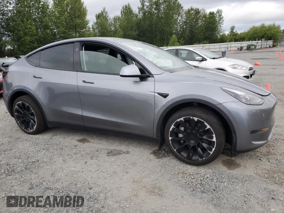 2024 Tesla Model Y Long Range with VIN 7SAYGDEE1RF159332, listed as a Copart auction lot 61179495 with 9,259 mi miles and Salvage title. Bid and sale history available at DreamBid. Image 4.