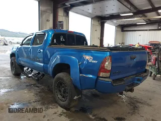 2009 Toyota Tacoma z VIN 5TEMU52N29Z656158, wystawiony jako IAAI lot #41652533 z przebiegiem 138 563 mil mil oraz . Historia ofert i sprzedaży dostępna na DreamBid. Obrazek 3.