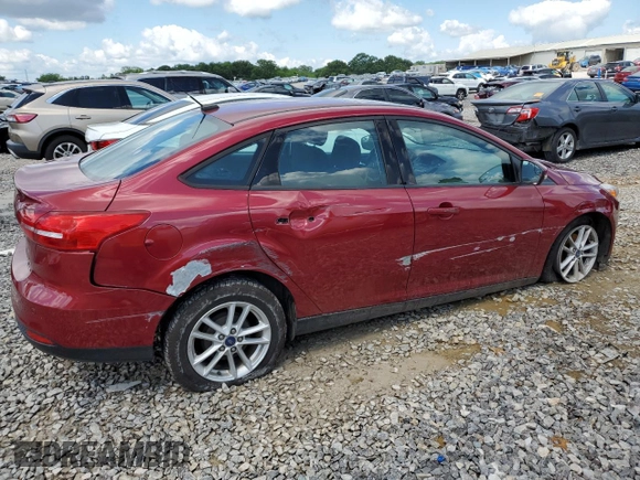 2016 Ford Focus SE z VIN 1FADP3F22GL355192, wystawiony jako Copart lot #56614225 z przebiegiem 56 214 mil mil oraz Szkoda całkowita • Salvage title. Historia ofert i sprzedaży dostępna na DreamBid. Obrazek 3.