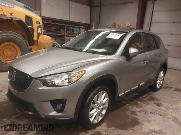 2014 Mazda CX-5 Grand Touring with VIN JM3KE4DY5E0305882, listed as a IAAI auction lot 41879532 with 173,443 mi miles. Bid and sale history available at carsss.com. Image 17.