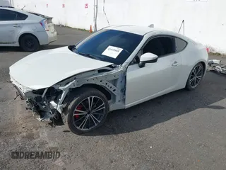 2019 Toyota 86 with VIN JF1ZNAA13K8700059, listed as a IAAI auction lot 41642688 with 112,743 mi miles. Bid and sale history available at carsss.com. Image 2.