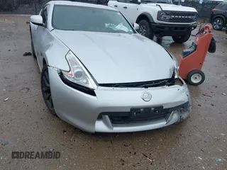 2010 Nissan 370Z Touring z VIN JN1AZ4EH9AM503264, wystawiony jako IAAI lot #42180901 z przebiegiem Nie podano mil oraz . Historia ofert i sprzedaży dostępna na DreamBid. Obrazek 1.