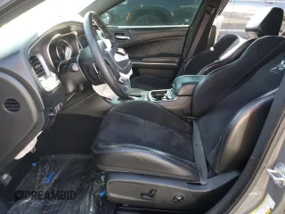 2019 Dodge Charger Scat Pack with VIN 2C3CDXGJ0KH614767, listed as a Copart auction lot 46982365 with 58,390 mi miles and Salvage title. Bid and sale history available at DreamBid. Image 7.