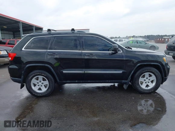2012 Jeep Grand Cherokee Laredo with VIN 1C4RJEAG2CC259279, listed as a IAAI auction lot 41768024 with 185,161 mi miles. Bid and sale history available at carsss.com. Image 14.