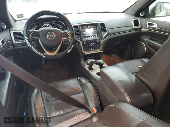 2015 Jeep Grand Cherokee Summit with VIN 1C4RJEJG8FC131925, listed as a Copart auction lot 55270785 with 130,425 mi miles and Salvage title. Bid and sale history available at DreamBid. Image 8.