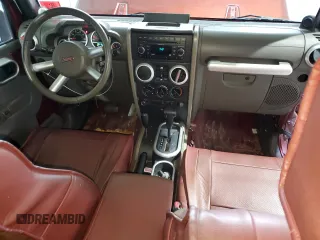 2007 Jeep Wrangler Unlimited Sahara с VIN 1J4GA591X7L198917, выставлен на аукционе Copart как лот 53311565 с пробегом 244 368 миль миль и Списание • Salvage title. История ставок и продаж доступна на DreamBid. Изображение 8.