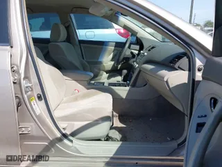 2007 Toyota Camry CE with VIN 4T1BE46K97U180782, listed as a IAAI auction lot 42046103 with 171,607 mi miles. Bid and sale history available at carsss.com. Image 5.