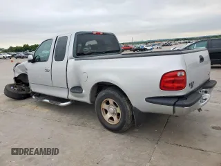2002 Ford F-150 XL z VIN 1FTRX07W72KB81327, wystawiony jako Copart lot #59488305 z przebiegiem 102 848 mil mil oraz Szkoda całkowita • Salvage title. Historia ofert i sprzedaży dostępna na DreamBid. Obrazek 2.