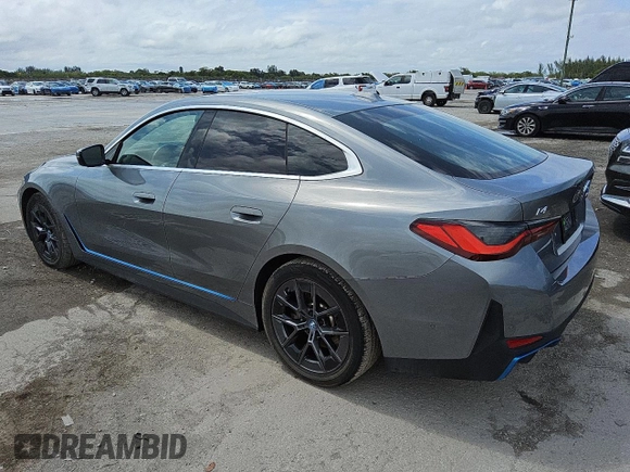 2024 BMW i4 eDrive40 z VIN WBY73AW0XRFS98892, wystawiony jako Copart lot #56057495 z przebiegiem 24 943 mil mil oraz Tytuł czysty. Historia ofert i sprzedaży dostępna na DreamBid. Obrazek 2.