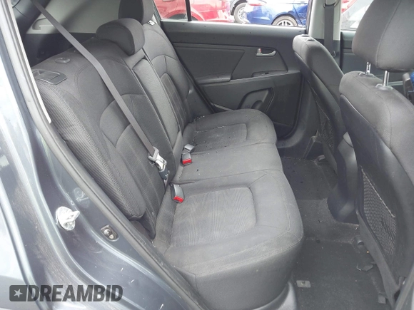 2013 Kia Sportage LX with VIN KNDPB3A26D7452008, listed as a IAAI auction lot 42435597 with 109,397 mi miles and . Bid and sale history available at DreamBid. Image 8.
