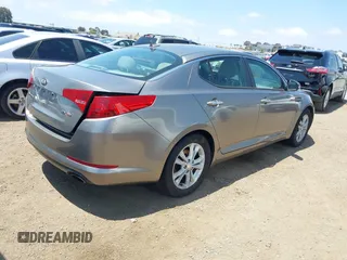 2013 Kia Optima EX with VIN 5XXGN4A77DG244364, listed as a IAAI auction lot 42179051 with 184,416 mi miles and . Bid and sale history available at carsss.com. Image 4.