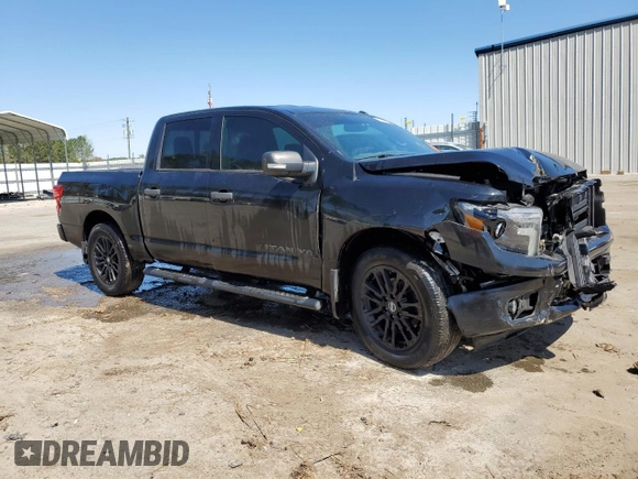 2018 Nissan Titan SV with VIN 1N6AA1E61JN520777, listed as a Copart auction lot 50312605 with 62,122 mi miles and Salvage Title. Bid and sale history available at DreamBid. Image 4.