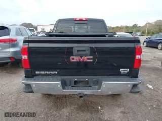 2014 GMC Sierra 1500 SLT with VIN 1GTV2VEJXEZ389280, listed as a IAAI auction lot 41370436 with 124,311 mi miles. Bid and sale history available at carsss.com. Image 16.