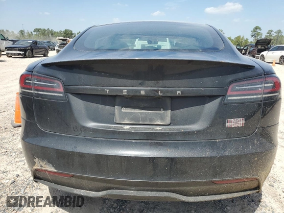 2023 Tesla Model S Plaid with VIN 5YJSA1E62PF511875, listed as a Copart auction lot 65583824 with Not provided miles and Salvage title. Bid and sale history available at DreamBid. Image 6.