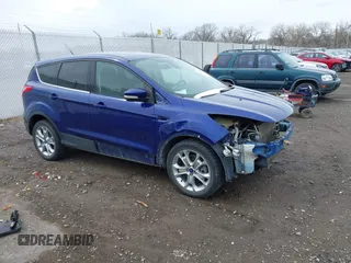 2013 Ford Escape SEL with VIN 1FMCU9H92DUA47288, listed as a IAAI auction lot 41912588 with 165,728 mi miles. Bid and sale history available at carsss.com. Image 1.