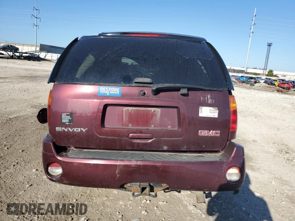 2007 GMC Envoy SLT with VIN 1GKDT13SX72107510, listed as a Copart auction lot 73031874 with Not Provided miles and Salvage Title. Bid and sale history available at DreamBid. Image 6.