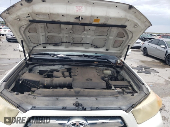 2010 Toyota 4Runner Trail с VIN JTEBU5JR4A5031291, выставлен на аукционе Copart как лот 60797145 с пробегом 171 228 миль миль и Списание • Salvage title. История ставок и продаж доступна на DreamBid. Изображение 12.