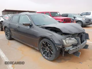 2015 Chrysler 300 with VIN 2C3CCABG1FH882177, listed as a IAAI auction lot 41765486 with 152,546 mi miles. Bid and sale history available at carsss.com. Image 1.