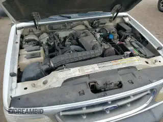 1999 Ford Explorer with VIN 1FMZU32X4XZB11031, listed as a Copart auction lot 82640184 with 149,331 mi miles and Salvage title. Bid and sale history available at DreamBid. Image 14.