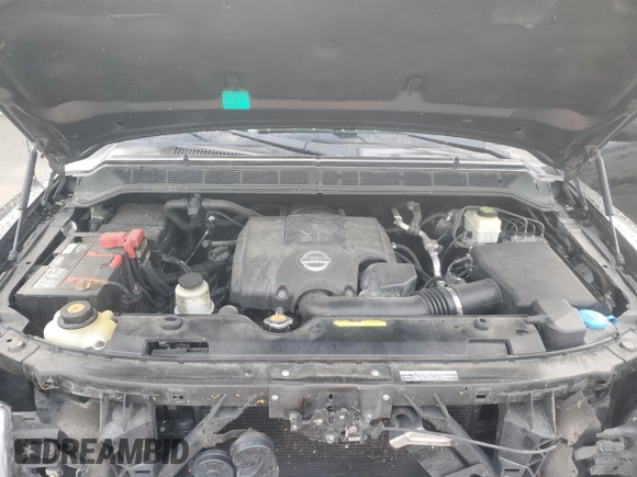 2015 Nissan Titan SV z VIN 1N6BA0EC0FN503240, wystawiony jako Copart lot #72539284 z przebiegiem 149 416 mil mil oraz Szkoda całkowita • Salvage title. Historia ofert i sprzedaży dostępna na DreamBid. Obrazek 12.