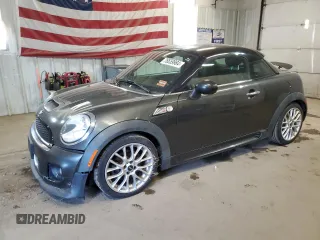 2012 MINI Coupe S z VIN WMWSX3C50CT154835, wystawiony jako Copart lot #76659984 z przebiegiem 122 425 mil mil oraz Szkody całkowita. Historia ofert i sprzedaży dostępna na DreamBid. Obrazek 1.