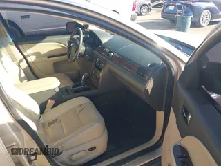 2008 Ford Taurus SEL with VIN 1FAHP24W38G111319, listed as a IAAI auction lot 41585092 with 216,419 mi miles. Bid and sale history available at carsss.com. Image 5.