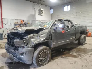 2018 GMC Sierra 2500HD Denali z VIN 1GT12UEY9JF121158, wystawiony jako Copart lot #87449504 z przebiegiem 170 506 mil mil oraz Szkody całkowita. Historia ofert i sprzedaży dostępna na DreamBid. Obrazek 1.