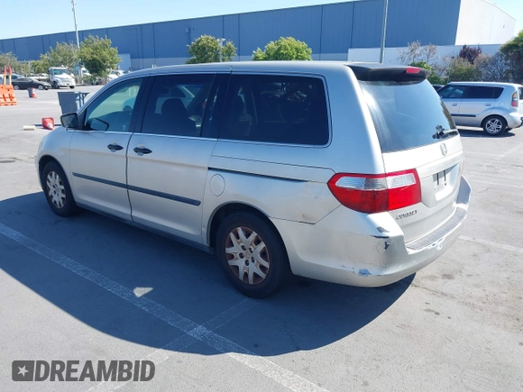 2006 Honda Odyssey LX with VIN 5FNRL38226B085181, listed as a IAAI auction lot 42594621 with 210,616 mi miles and . Bid and sale history available at DreamBid. Image 3.
